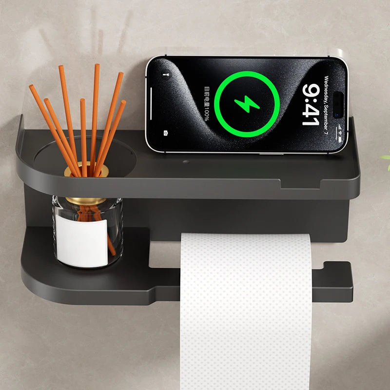 Elevate bathroom refinement with this No-Drill Toilet Paper Holder and Shelf. Wall-mounted organizer discreetly dispenses rolls while showcasing plants, toiletries, or accents.