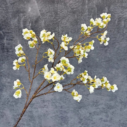 Infuse timeless serenity with these 40in Artificial Cherry Blossom Stems. Lifelike faux sakura branches bring ethereal Japanese elegance to weddings or homes.