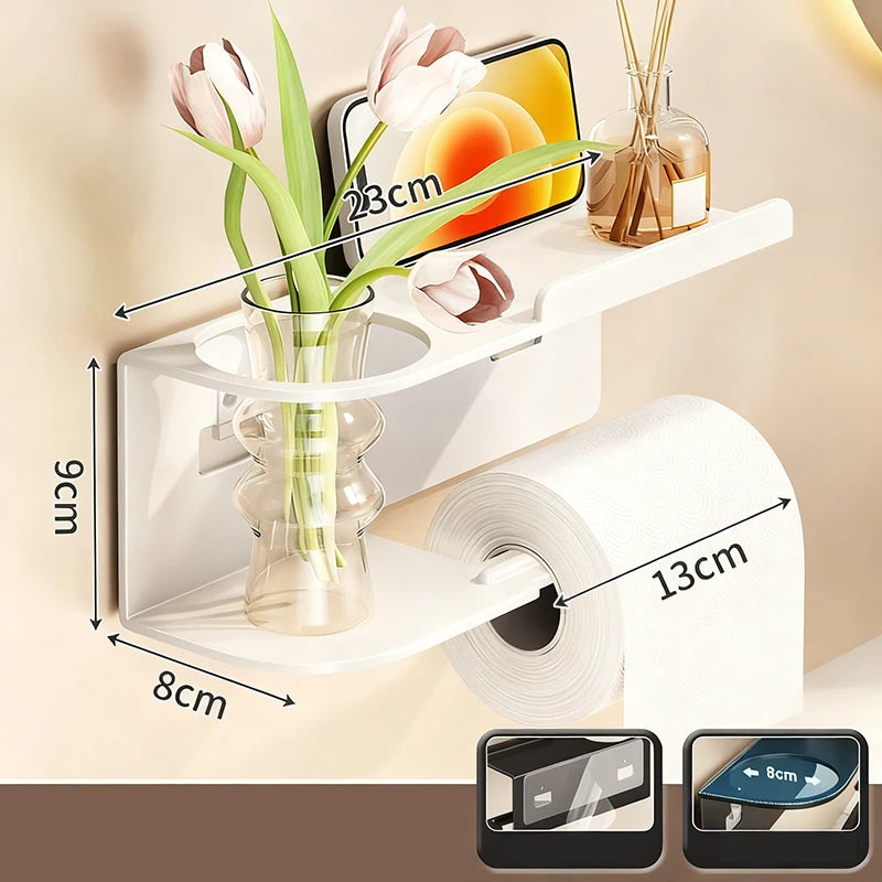 Elevate bathroom refinement with this No-Drill Toilet Paper Holder and Shelf. Wall-mounted organizer discreetly dispenses rolls while showcasing plants, toiletries, or accents.