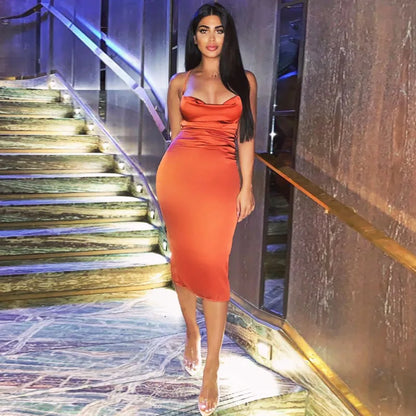 Flowing silhouette with a sexy sling neckline and side split for chic movement. Perfect for casual outings, parties, or pairing with accessories.