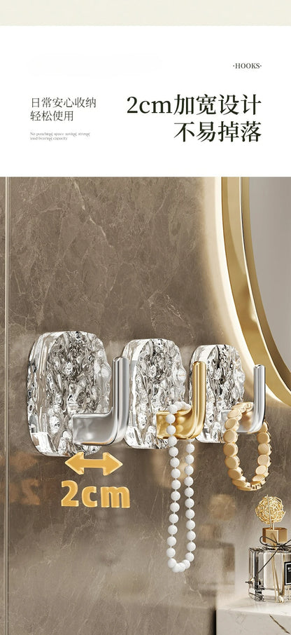 Curate flawless order with these 4-Pc Transparent Acrylic Self-Adhesive Wall Hooks. Strong, punch-free mounts discreetly suspend towels, bags, keys, and cloths in bathrooms or kitchens.