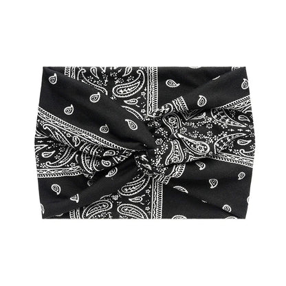Elevate active glamour with these Twisted Wide Headbands for Women. Extra-large turban style fuses boho thickness with yoga/workout prowess for effortless hair mastery.