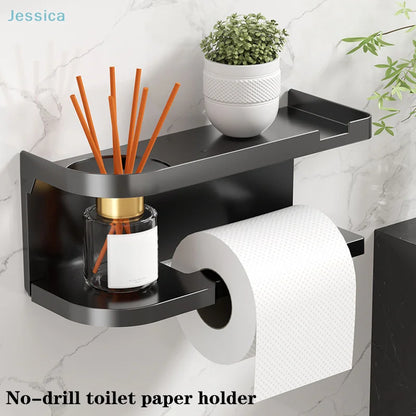 Elevate bathroom refinement with this No-Drill Toilet Paper Holder and Shelf. Wall-mounted organizer discreetly dispenses rolls while showcasing plants, toiletries, or accents.