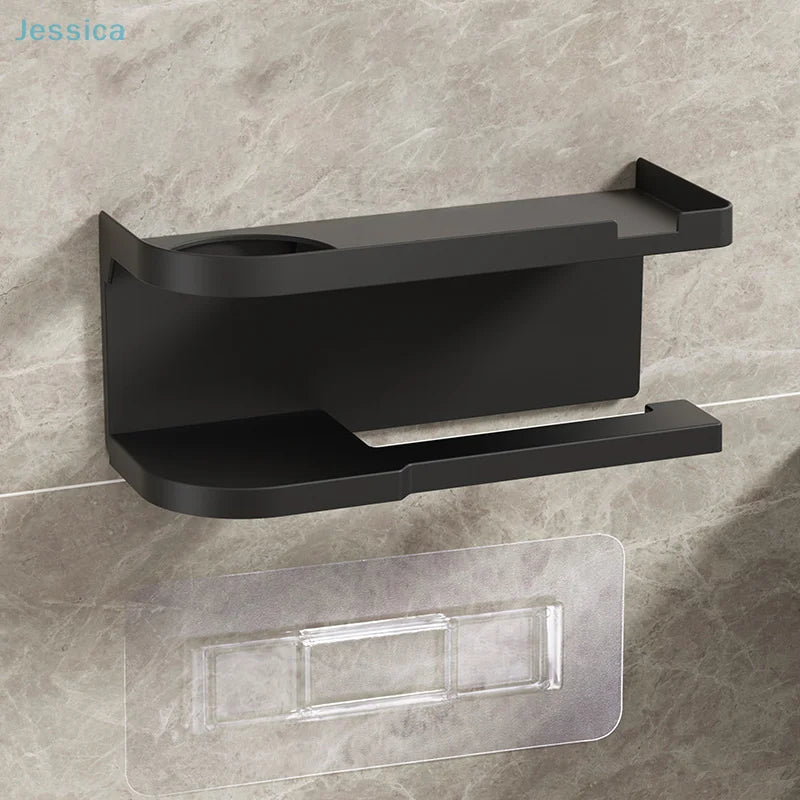Elevate bathroom refinement with this No-Drill Toilet Paper Holder and Shelf. Wall-mounted organizer discreetly dispenses rolls while showcasing plants, toiletries, or accents.
