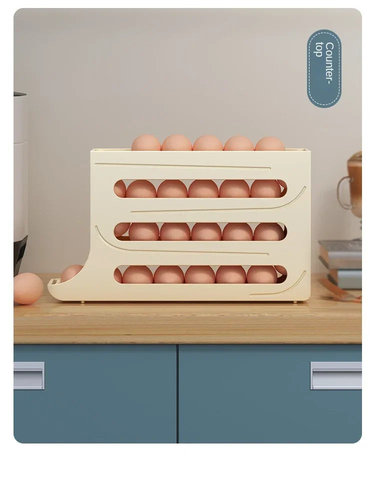 Revolutionize fridge elegance with this 4-Layer Automatic Rolling Egg Storage Box. Gravity-fed dispenser holds 30 eggs, dispensing freshest first for effortless kitchen opulence.