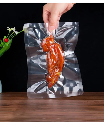 Preserve freshness like a pro with the New Vacuum Sealing Machine compact food sealer for kitchen products, meats, and plastic bags. This home appliance vacuums and seals instantly to lock in flavor and extend shelf life. Effortless storage for bulk buys.