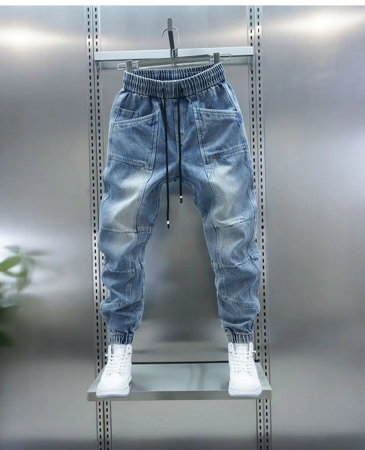 Unlock urban edge with these Fashionable Harem Jeans – luxury brand outdoor casual men's trousers blending harem style with everyday versatility. Dropped crotch and relaxed fit offer comfort across four seasons for daily wear.