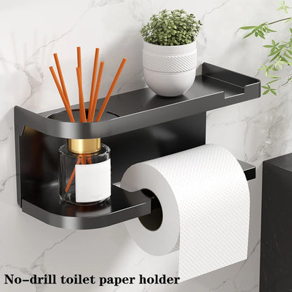 Elevate bathroom refinement with this No-Drill Toilet Paper Holder and Shelf. Wall-mounted organizer discreetly dispenses rolls while showcasing plants, toiletries, or accents.