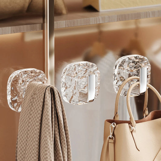 Curate flawless order with these 4-Pc Transparent Acrylic Self-Adhesive Wall Hooks. Strong, punch-free mounts discreetly suspend towels, bags, keys, and cloths in bathrooms or kitchens.